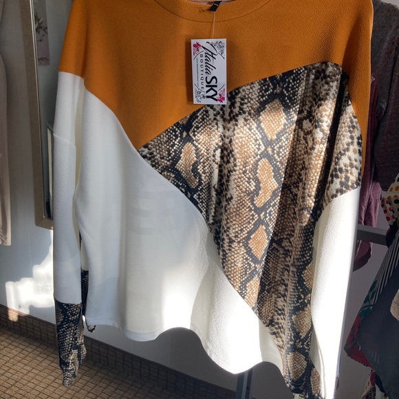 Tops - Multi color long sleeve top. Snake skin pattern.